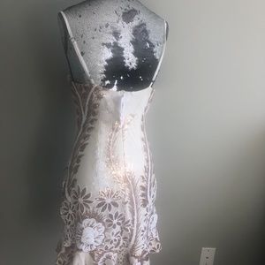 Short ( not mini) gold and white sequin dress.